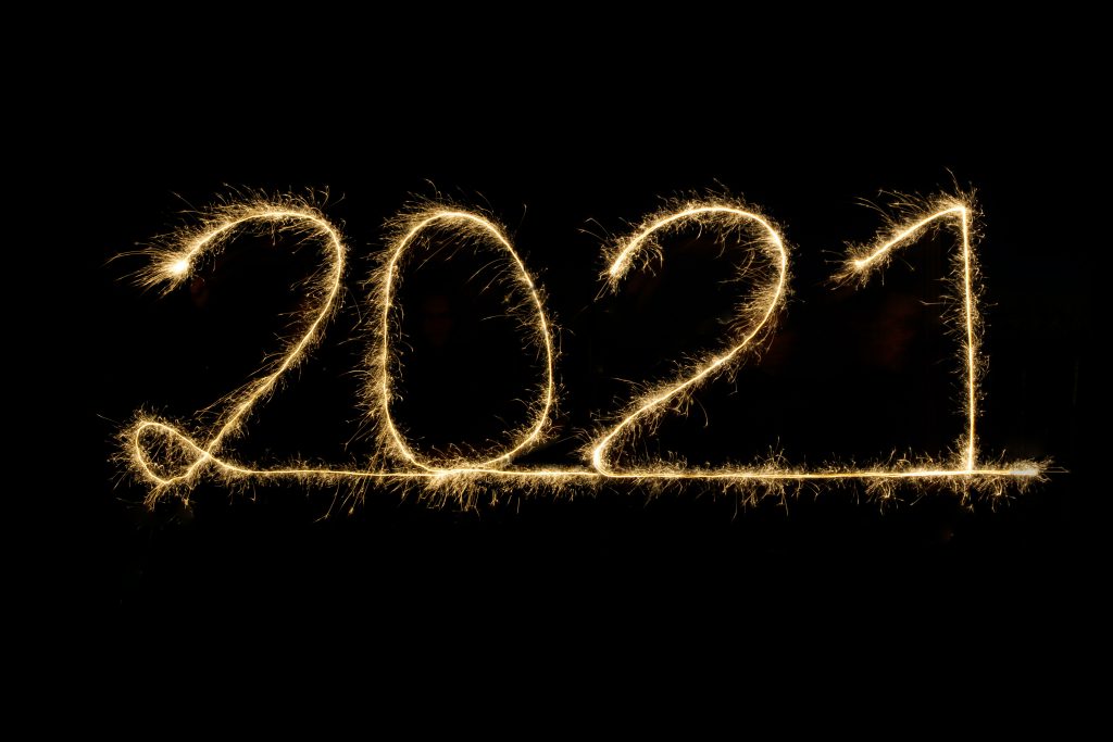 The number 2021 spelled out in yellow sparkles
